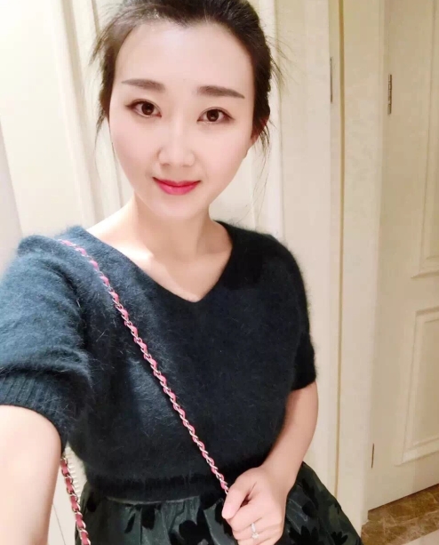 小妮的第三张照片--南安婚介网